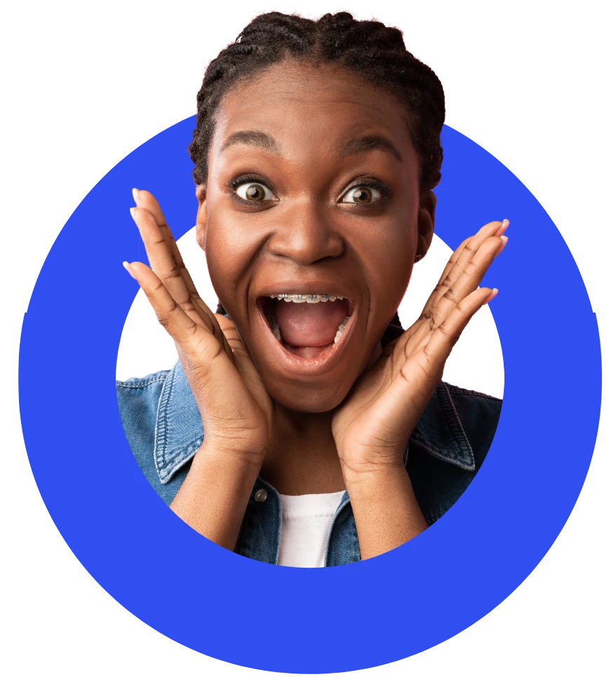 Amazed woman with hands on her face